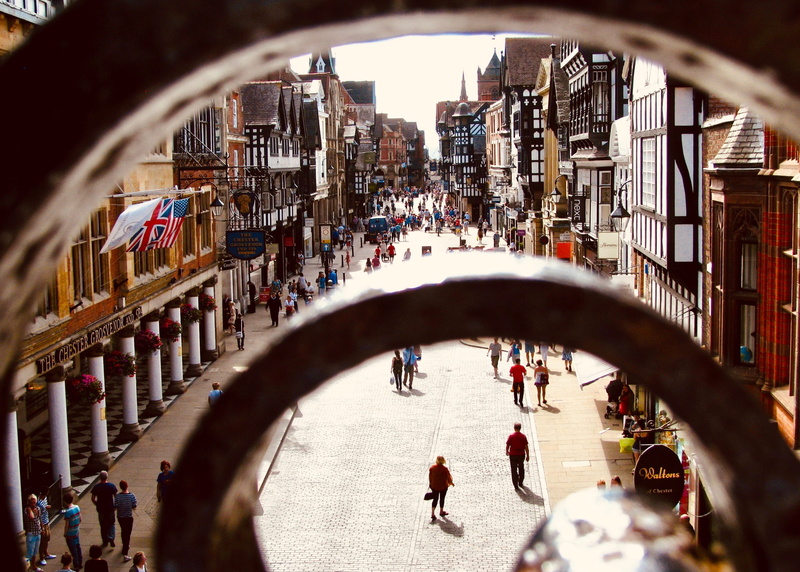 2K, built structure, women, selective focus, outdoors, crowd, group of people, men, real people, city life, adult, pedestrian zone, arch, high angle view