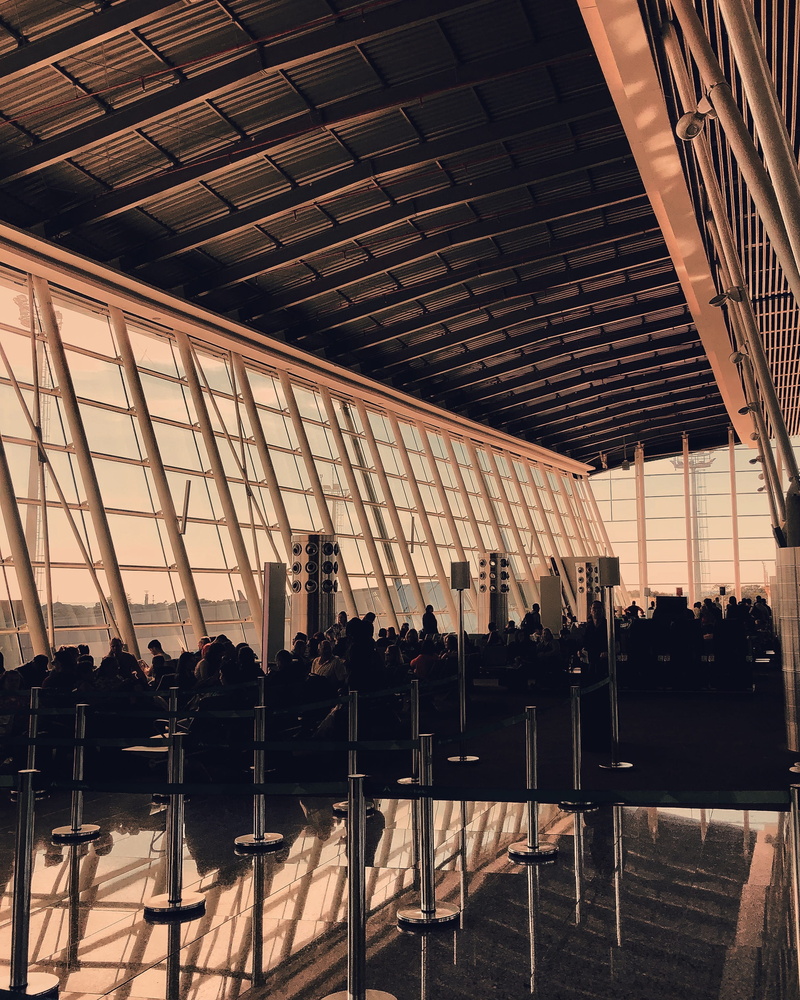 indoor, airport terminal, interior, glass - material, people, reflection, travel, transparent, architecture, large group of people, furniture, day, women