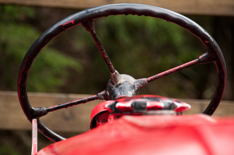 steering wheel, metal, tire, mode of transportation, pedal, focus on foreground, outdoors, motion, old, 4K, no people, close-up, frayed, day, tractor