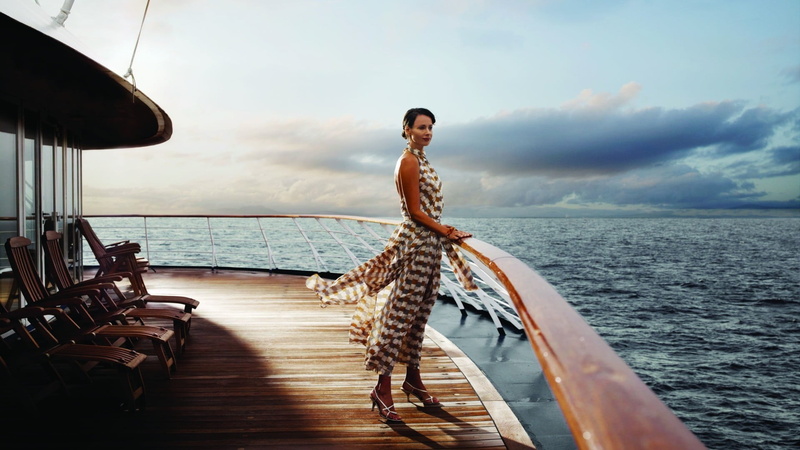 water, beautiful woman, fashion, full length, adult, lifestyles, vacations, one person, deck chairs, cruise ship, sky, cloud - sky, women, horizon over water