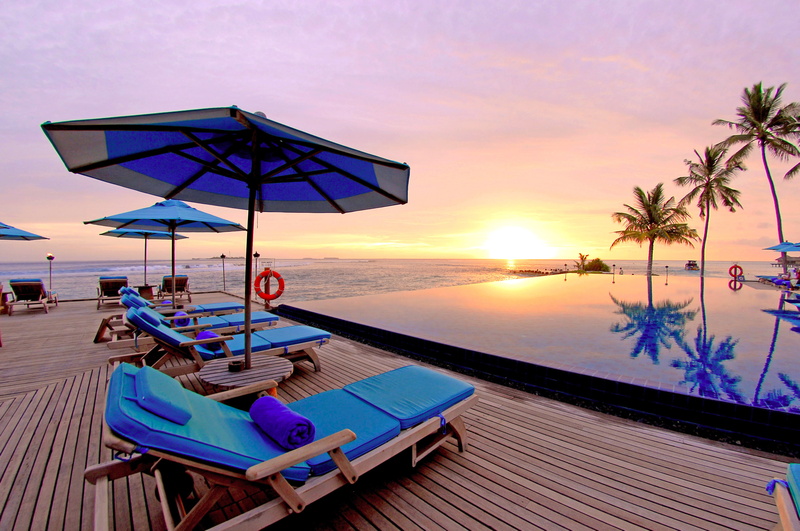 no People, outdoor chair, scenics - nature, tanning Bed, summer, scenics, sun, tranquility, tourism, blue, sand, tree, luxury, umbrella, swimming pool