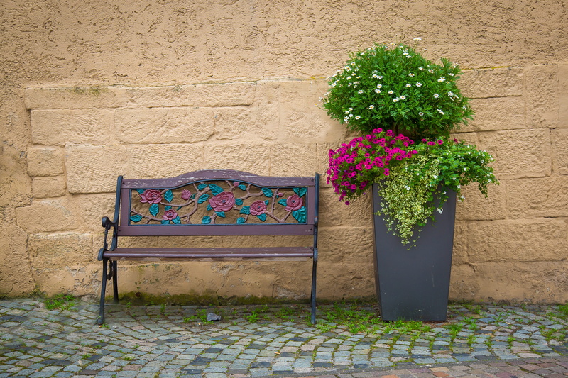 bench, sit, outdoors, recovery, day, building exterior, resting place, floral pattern, street, silent, potted plant, pattern, flowering plant, growth, bank