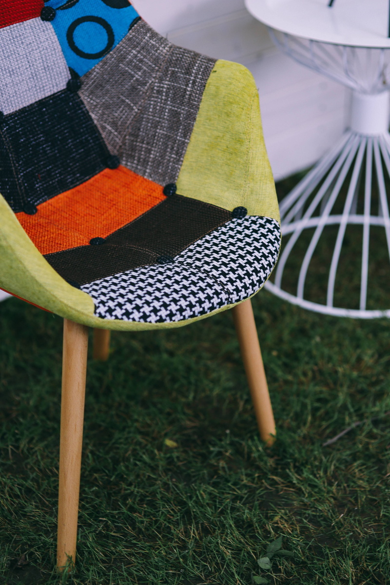 green color, outside, leisure activity, various, relax, chair, field, day, textile, lifestyles, plant, grass, real people, people, only women, one person