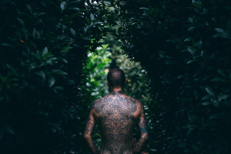 day, male, outdoors, lifestyles, illustration, tattooed, 2K, leisure activity, shirtless, forest, land, waist up, man, growth, bush, real people, one person