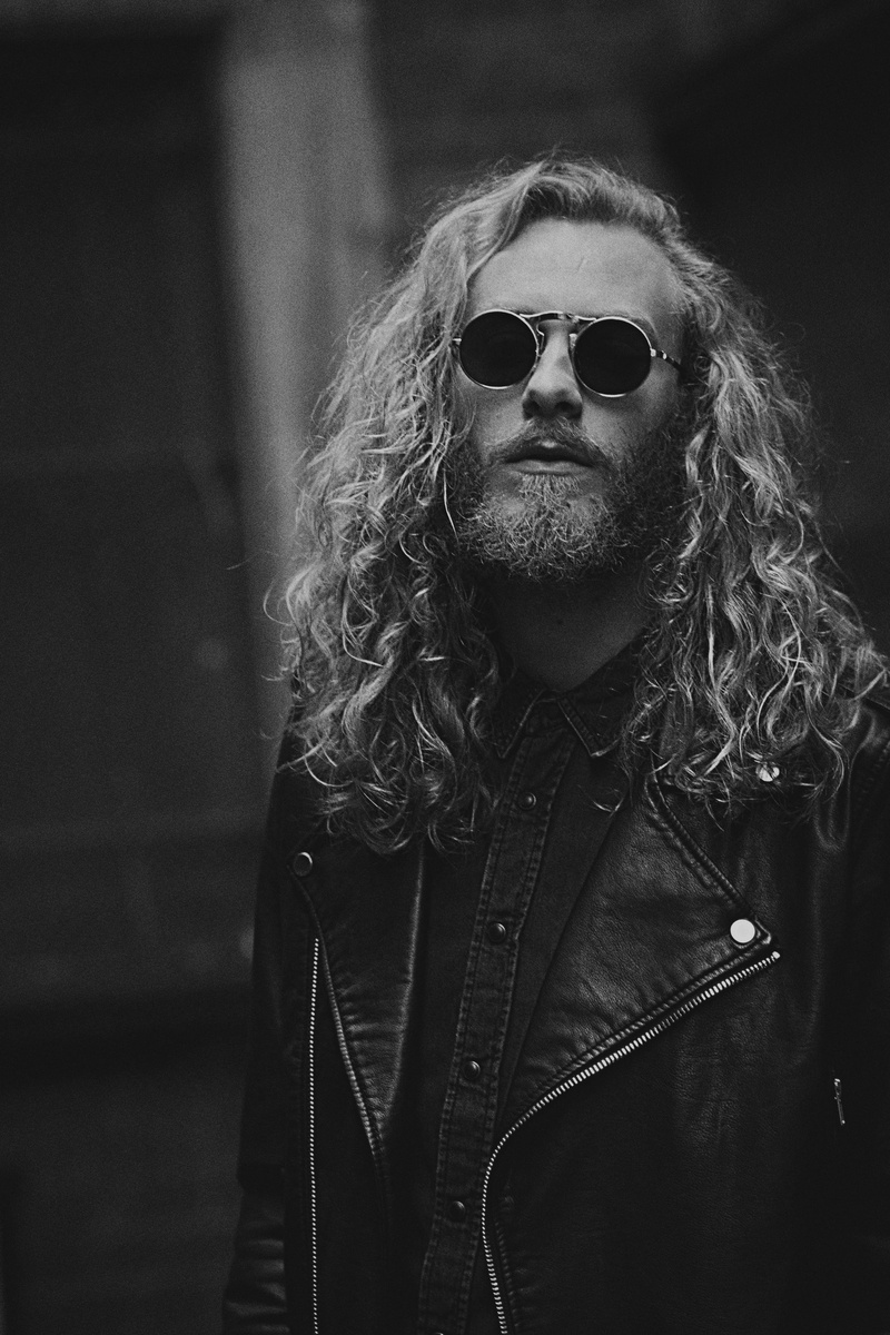 male, hairstyle, front view, portrait, long hair, blacknwhite, sunglasses, beard, shirt, lifestyles, grayscale, eyewear, person, photo, leisure activity