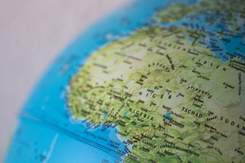 Africa, text, planet earth, selective focus, sphere, global communications, studio shot, travel destinations, continent, no people, blue, Sea, topography