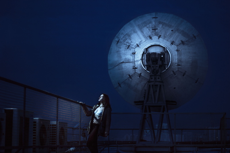 one person, railing, antennas, standing, night, nature, men, city, space, women, side view, dark, light, 5K, adult, consumption, coat, astronomy, contemplation