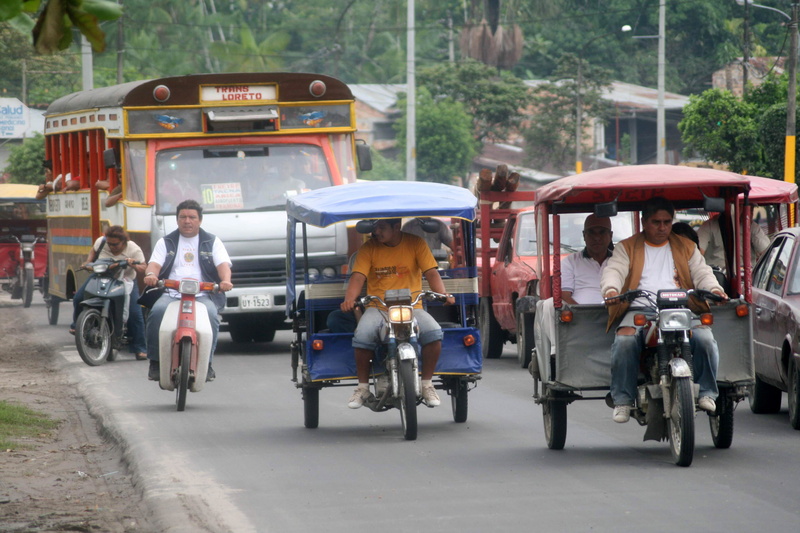 qui, women, land Vehicle, mode of transportation, urban Scene, real people, motorcycle, rickshaw, Iquitos, travel Destinations, transportation, city, day