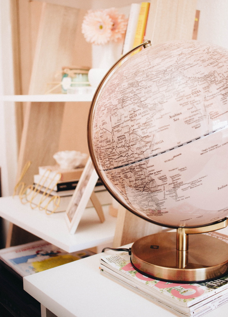 sphere, map, shelf, world, indoors, communication, container, home, focus on foreground, home office, colored, near, places, brass, decor, globe - man made object