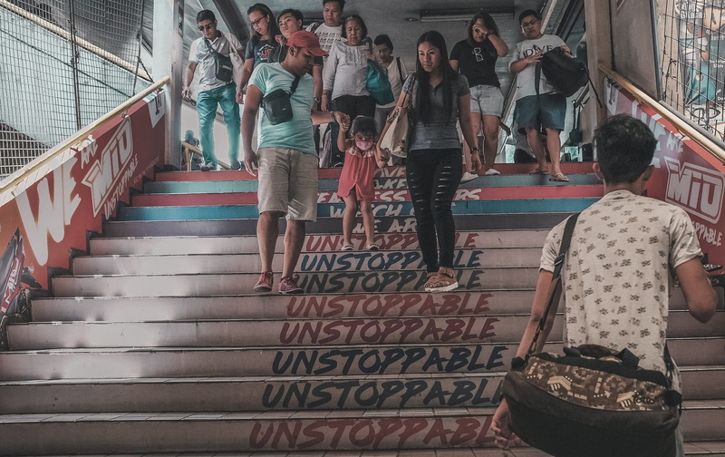 travel destination, large group of people, architecture, humanity, street photography, casual clothing, staircase, train station, leisure activity, walking
