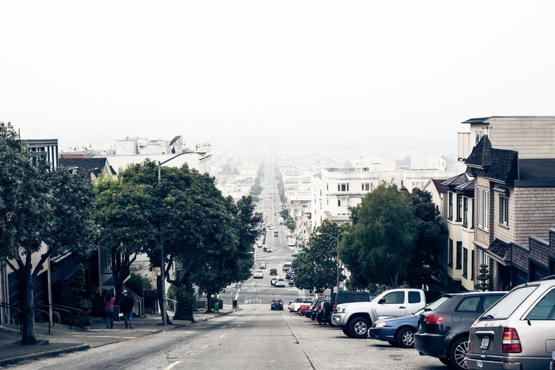depth of field, street, city, urban Scene, building, architecture, slope, road, building exterior, mode of transportation, the way forward, car, transportation