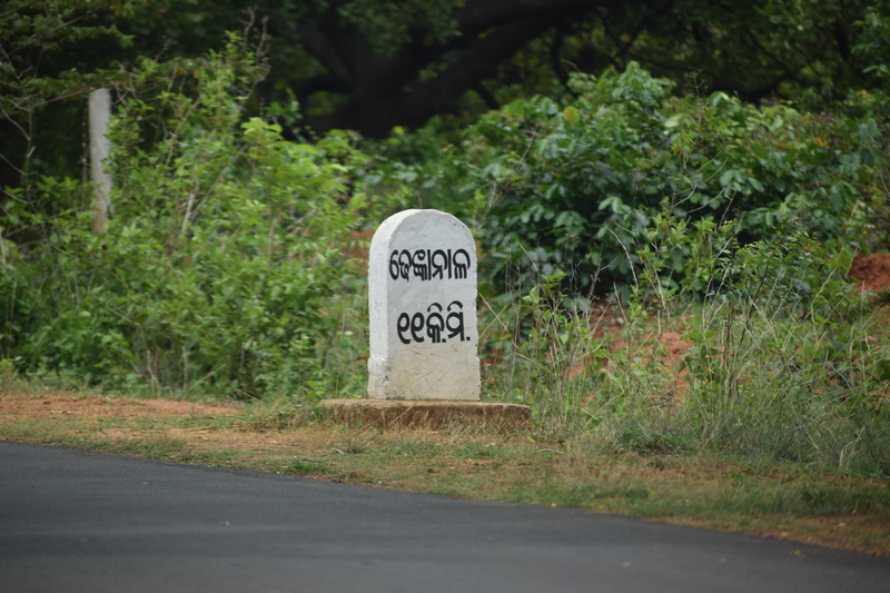 green color, no people, plant, day, transport, dhenkanal, journey, 5K, grass, signs, sign, guidance, miles, western script, land, km, focus on foreground