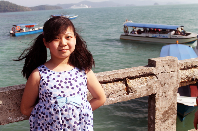 little, women, one person, smiling, kids, sea, happy, front view, focus on foreground, outdoors, leisure activity, langkawi island, girls, water, transportation