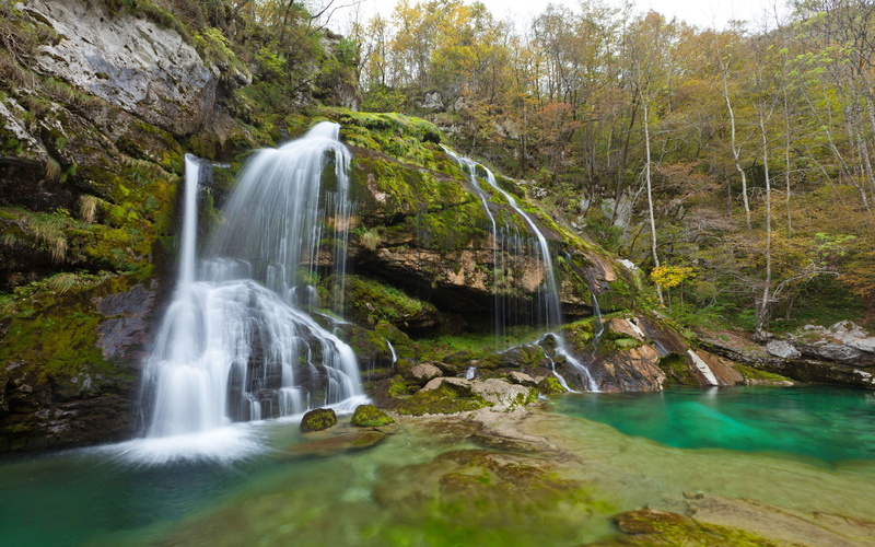 beauty in nature, waterfall, tree, virje, no people, bovec, non-urban scene, part, town, environment, motion, scenics - nature, rock, solid, mountain, flowing