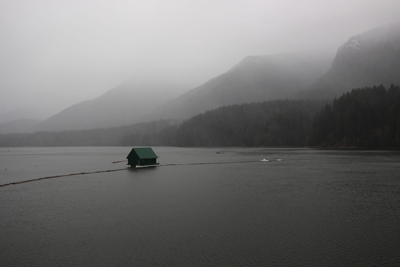 ominous, beauty in nature, mountain, tranquility, fog, sky, mountain range, trees, non-urban scene, lake, water, mode of transportation, black and white