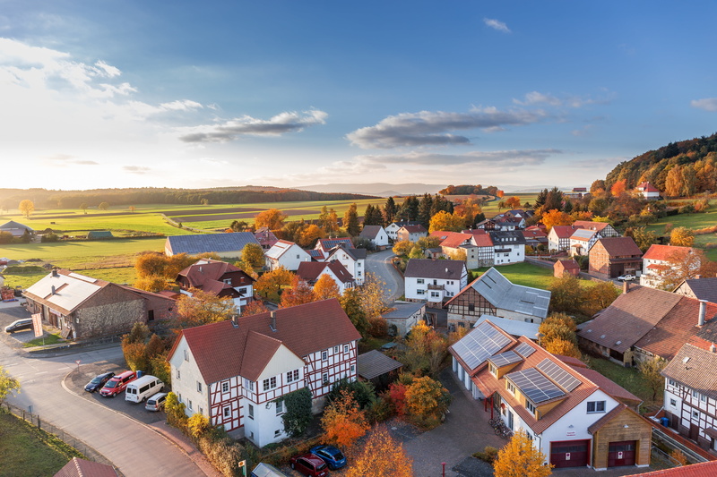 community, landscape, aerial view, cloud - sky, europe, houses, residential district, gray, mountains, outdoors, roof, church, top, sunlight, crowd, plant