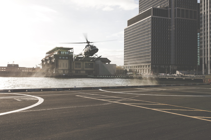 building, black, takeoff, outdoors, travel, no people, blade, near, helipad, lake, pavement, office building exterior, built structure, urban, art and craft