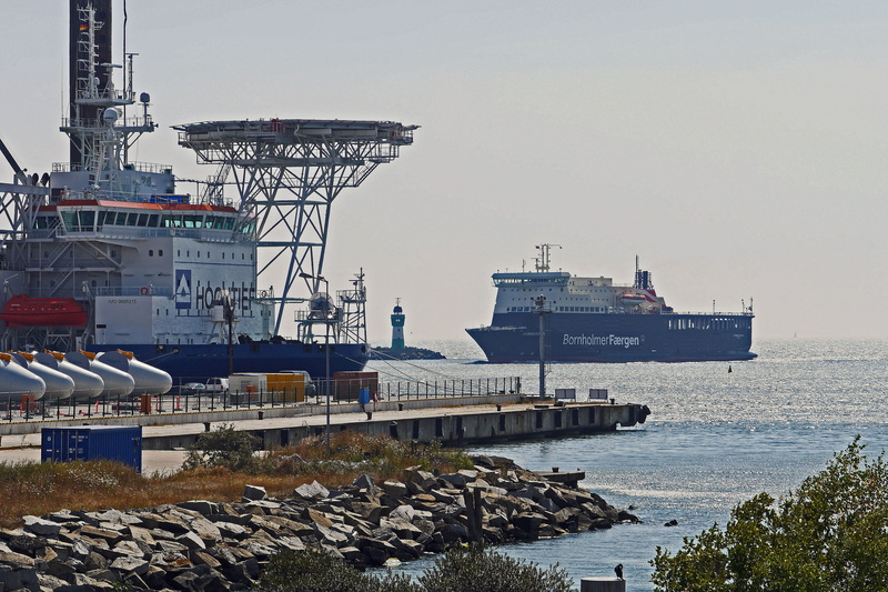 car ferry, nautical vessel, transportation, built structure, port, passenger ship, clear sky, nature, kai, cruise ship, sky, business, rock, helipad, shipping