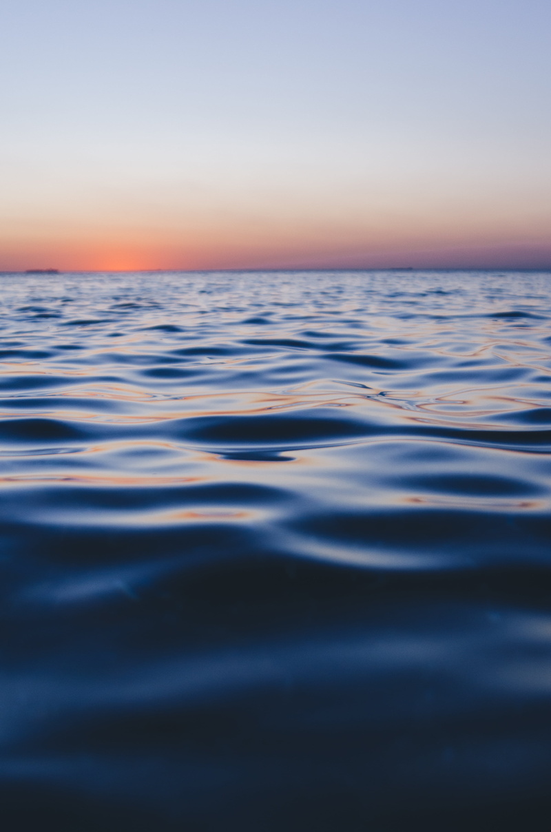 tranquility, no people, orange, ocean, rippled, waves, backgrounds, clouds, nature, rocks, current, adventure, horizon, sky, blue, sea, outdoors, tranquil scene