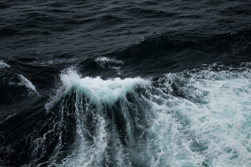 scenics - nature, blurred motion, flowing water, sea, beauty in nature, aquatic sport, power, outdoors, body, power in nature, no people, current, ocean