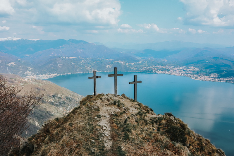 hill, weather, symbol, cloud - sky, landscape, beauty in nature, slope, promontory, coast, outdoors, tranquility, cross, ocean, nature, sky, tranquil scene