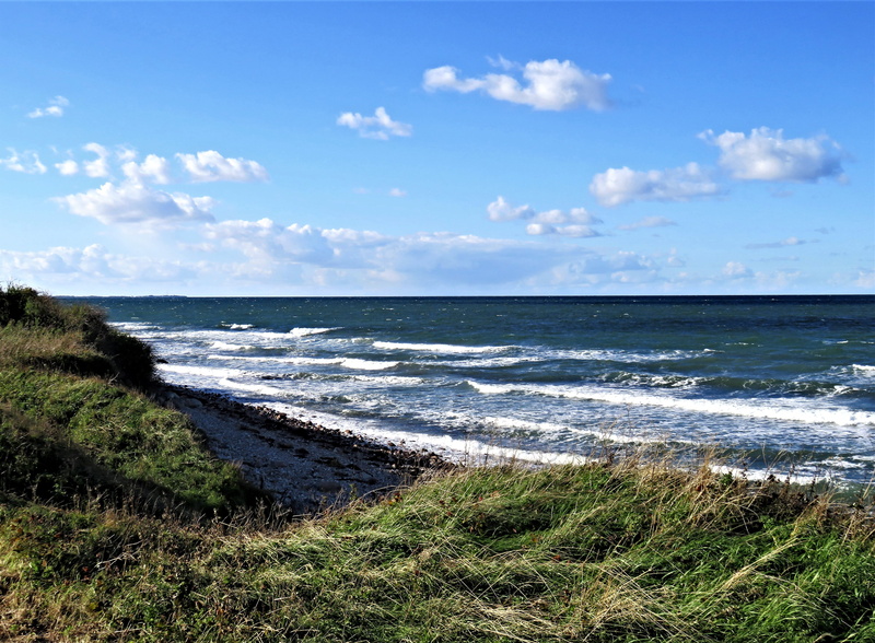 coast, beauty in nature, nature, wave, denmark, clouds, rough sea, tranquil scene, aquatic sport, land, water, no people, baltic sea, cloud - sky, blue sky
