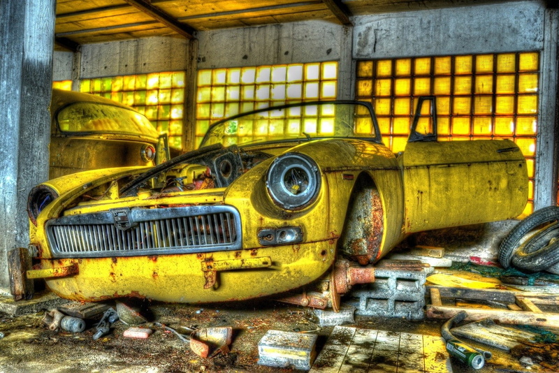 mode of transportation, transportation, rusty, gray, decline, old, near, obsolete, no people, day, garage, concrete, outdoors, land vehicle, motor vehicle