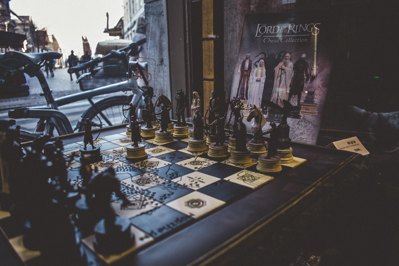 toys, business, script, game, architecture, western script, table, dark, building exterior, relaxation, chess, 5K, day, no people, built structure, lord-of-the-rings