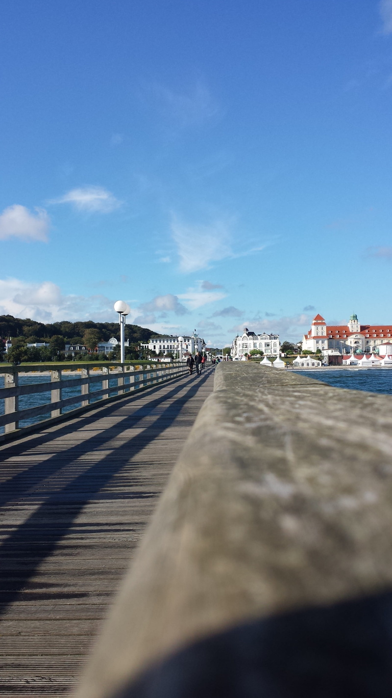 direction, sky, the way forward, water, city, built structure, diminishing perspective, transportation, 2K, binz, incidental people, railing, surface level