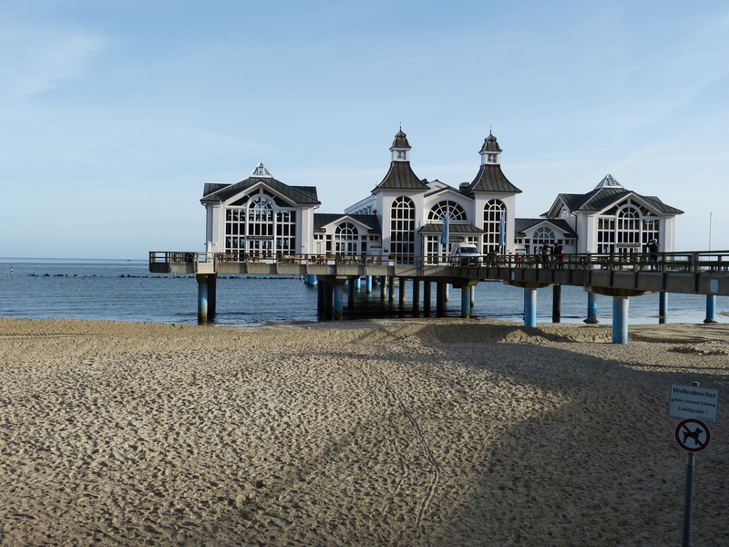 incidental people, seaside resort, sand, tourism, holiday, water, sea, travel destinations, baltic sea, rügen, sea bridge, sky, restaurant, built structure