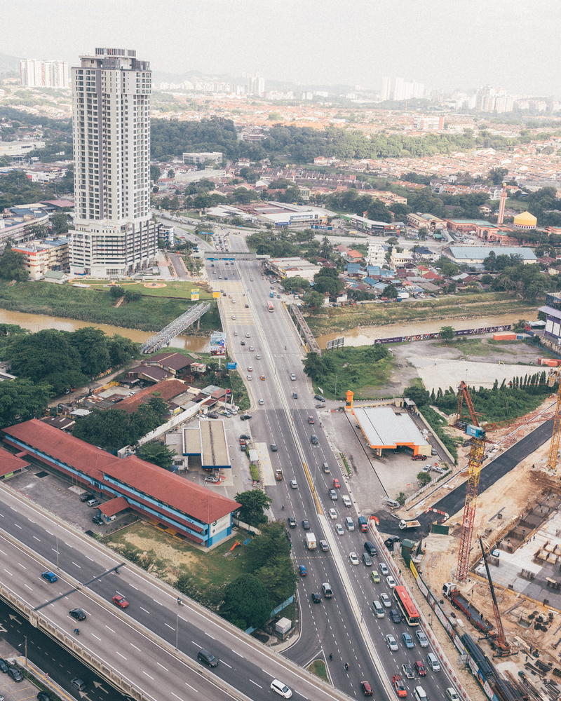 car, building, land vehicle, building exterior, day, asia, city, nature, travel, construction, jam, street, residential district, federal territory of kuala lumpur