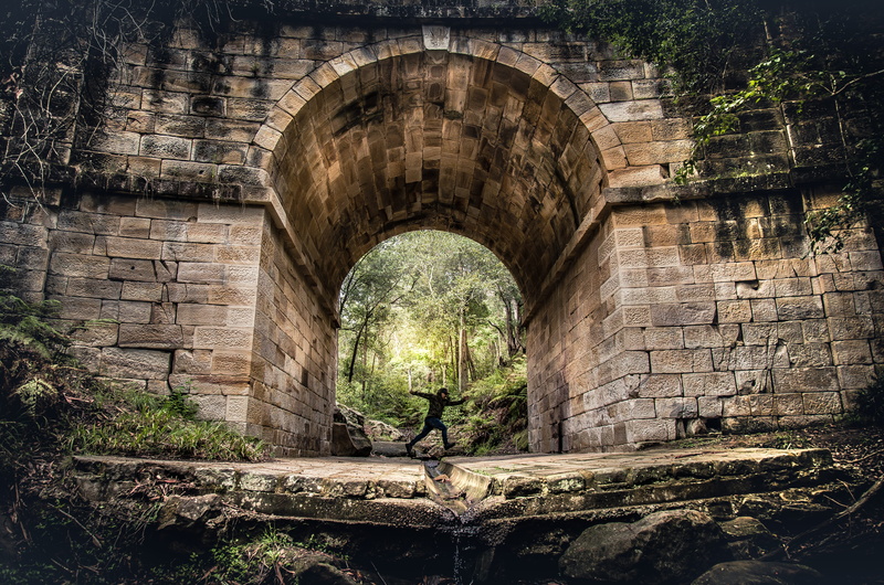 nature, wall, daytime, solid, arch, tunnel, outdoors, arch bridge, person, walking, bridge - Man Made Structure, ancient, history, leisure activity, lifestyles