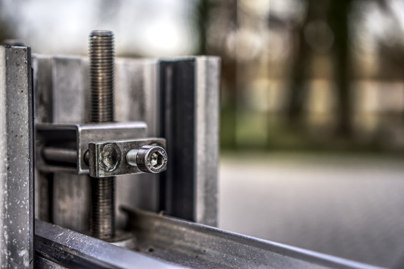 metal, security, steel, fixing, screw, festival, business, dike, close up, outdoors, flood protection, selective focus, machinery, stable, mounted, barrier