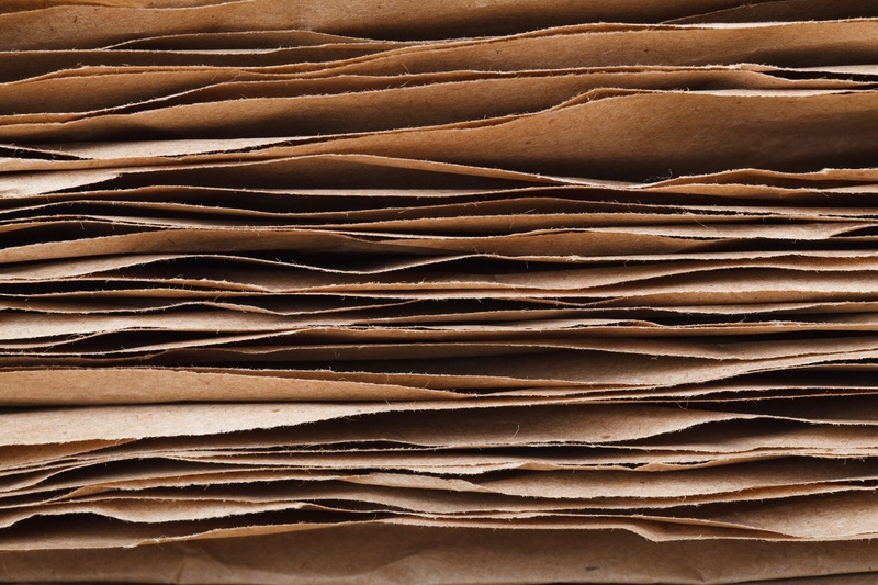 document, no people, still life, heap, cardboard, old, sheet, folded, stack, brown, abstract, food and drink, repetition, group of objects, paper