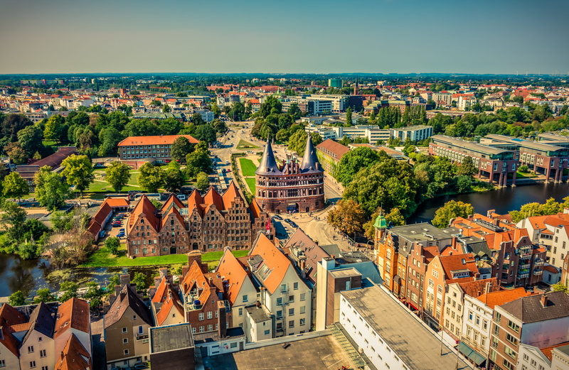 places of interest, travel destinations, building exterior, no people, plant, outdoors, history, historically, high angle view, holsten gate, cityscape