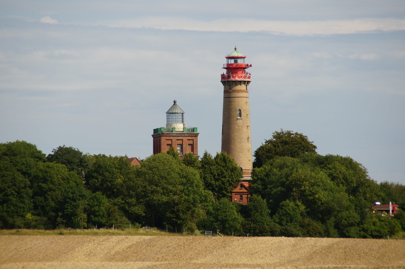 day, cloud - sky, lighthouse, outdoors, direction, no people, growth, tower, plant, security, sea, nature, rügen, guidance, architecture, baltic sea, building exterior