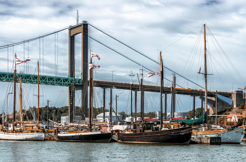 sweden, mode of transportation, water, day, sky, architecture, bridge - man made structure, boat masts, outdoors, clouds, pole, sailboat, transportation