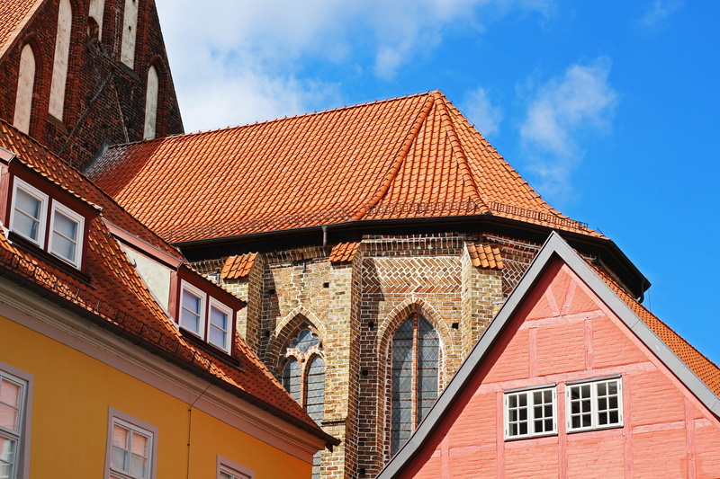 built structure, roof tile, tourism, downtown, day, history, modern, church, outdoors, building exterior, historically, tile, old, no people, city, place of worship