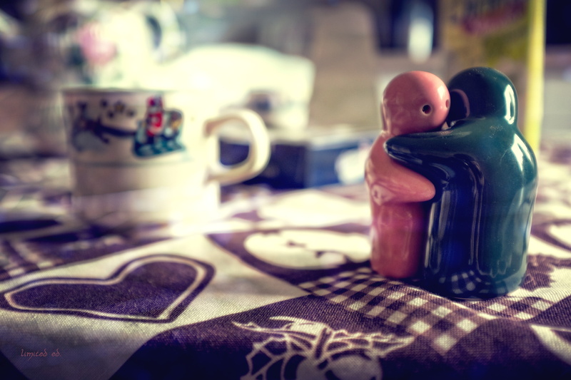 green, day, ceramic, cloth, indoors, temptation, hugging, focus on foreground, animal representation, freshness, art and craft, table, food and drink, coffee cup