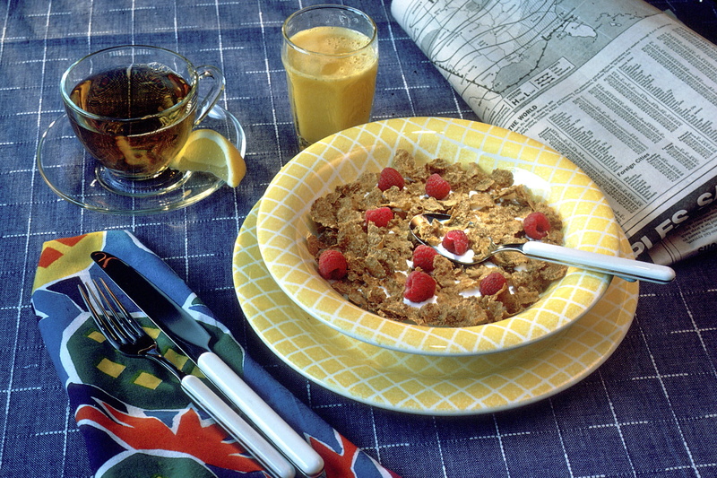 meal, eating utensil, fruit, refreshment, tablecloth, breakfast, drinking, plate, healthy eating, table knife, table, indoors, spoon, glass, kitchen utensil