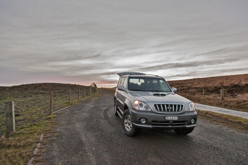 no people, terracan, dirt road, transportation, mountain, auto, scotland, cloud - sky, beauty in nature, mode of transportation, dynamic, wide angle, automotive