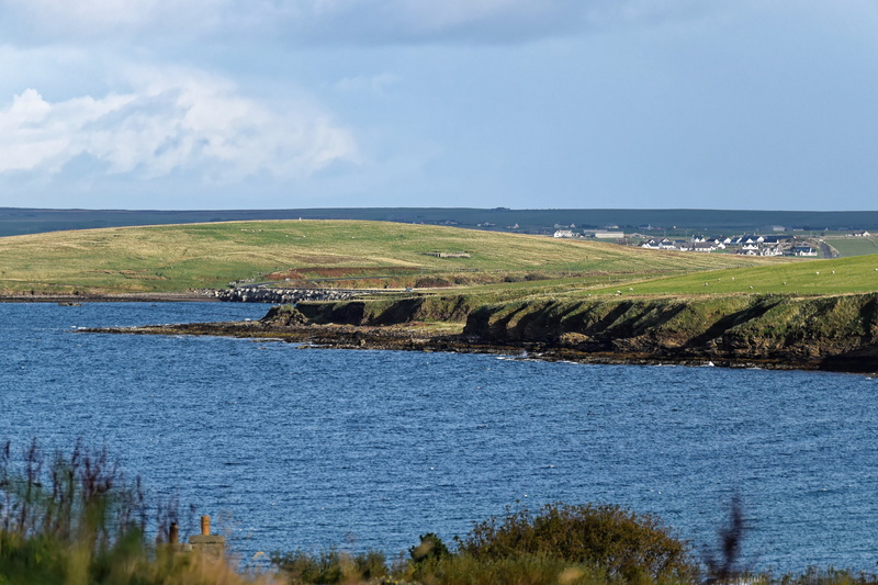 sky, blue, non-urban scene, orkney, lagoon, beauty in nature, seascape, plant, outdoor, tranquil scene, sunlight, idyllic, coastline, horizon, nature landscape