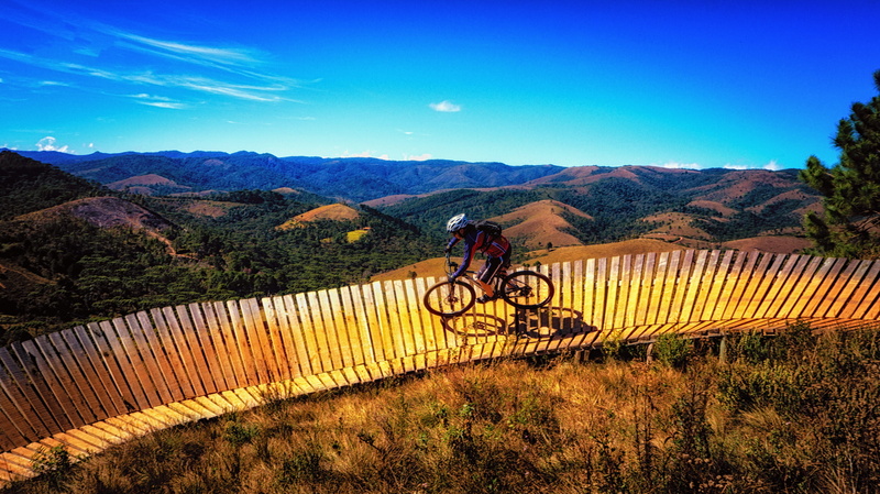 brown, people, bicycle, sky, adult, vegetation, sand, landscape, mode of transportation, visual, blue, helmet, perspective, sport, ride, horizon, mountain bike