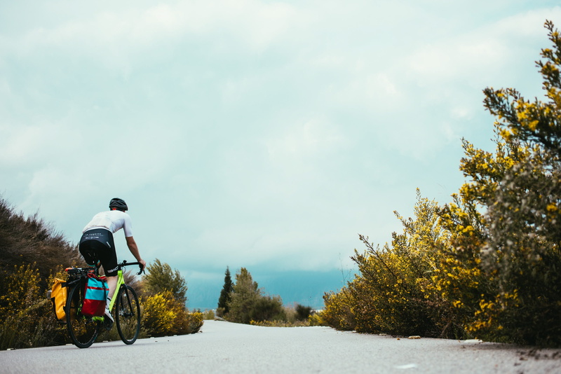 helmet, Green, rural, lifestyles, day, route, outdoor, crash helmet, asphalt, getaway, day trip, Scenic, rear view, ride, curve, country, road, overcast