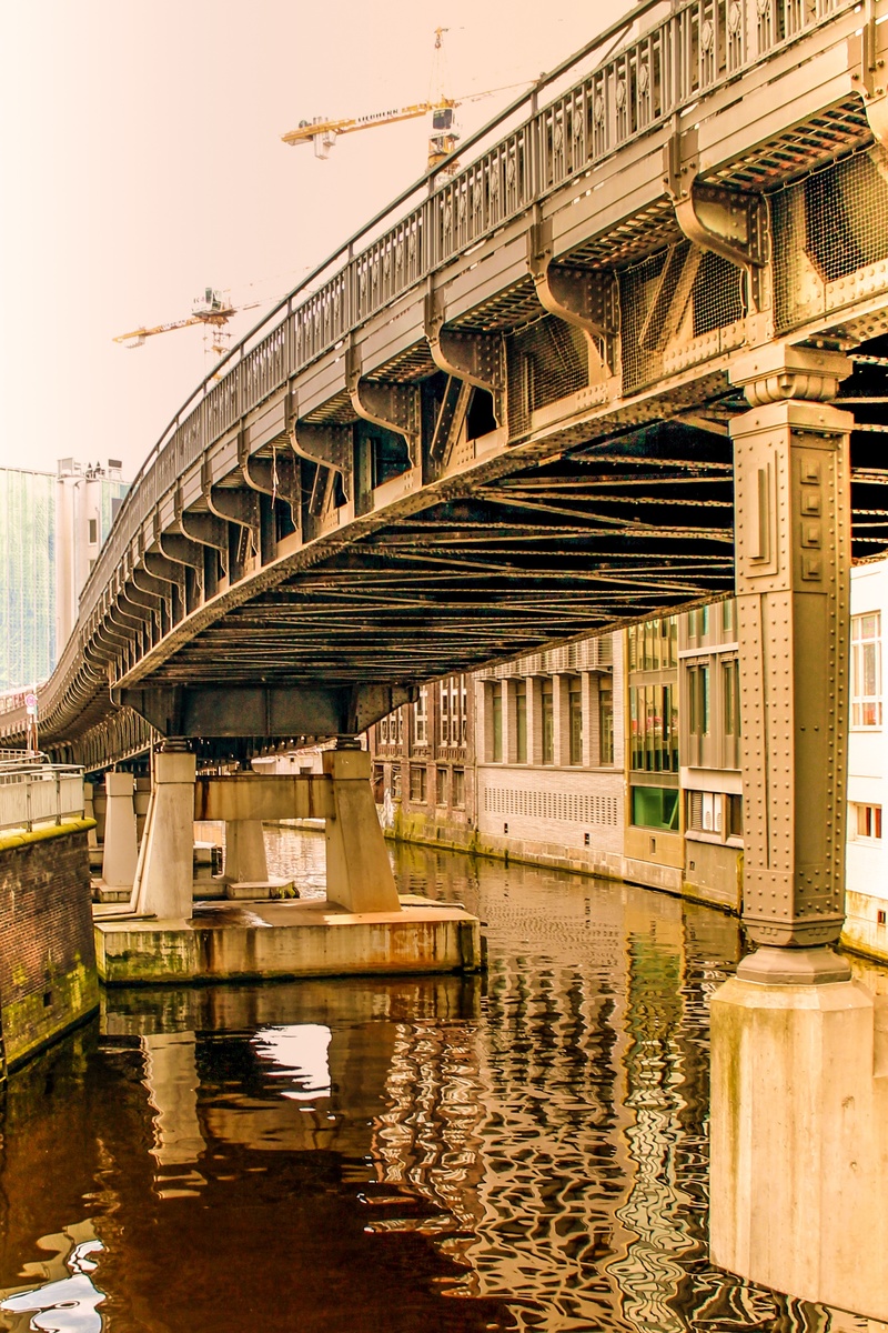 hamburg, building exterior, day, elbe philharmonic hall, bridge - man made structure, delete ship, tree, evening light, outdoors, arch bridge, port, reflection
