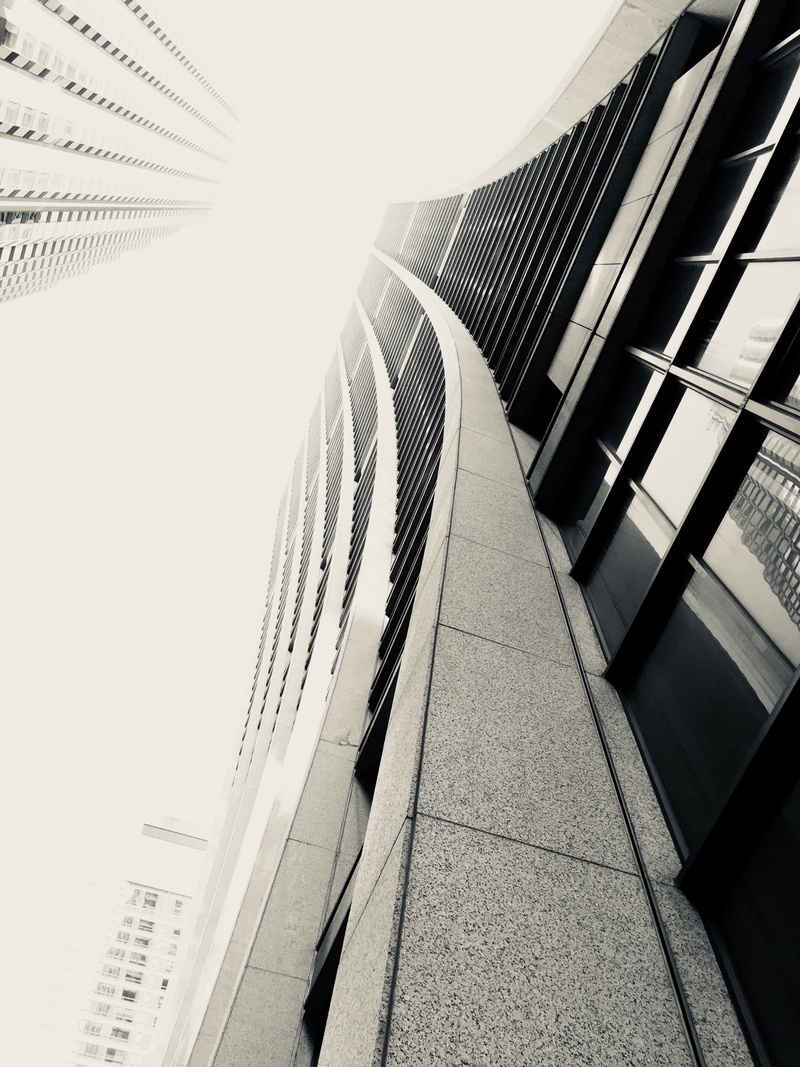 outdoors, sunlight, building, built structure, modern, clear sky, directly below, skyscraper, architecture, perspective, united states, nature, city, day