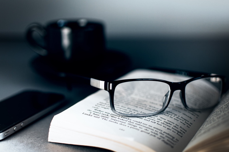 shadow, business, reading, corporate business, frame, technology, eyeglasses, black, absence, paper, table, newspaper, indoors, Cup, publication, wood - Material