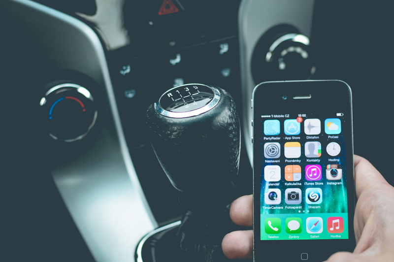number, vehicle, mobile, human hand, one man only, person, motor vehicle, personal perspective, automobile, smartphone, hand, black, transportation, car