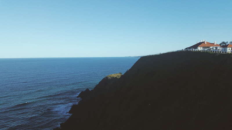 architecture, no people, sky, building exterior, water, ocean, land, horizon over water, blue, outdoors, byron bay, day, clear sky, cliff, 5K, horizon