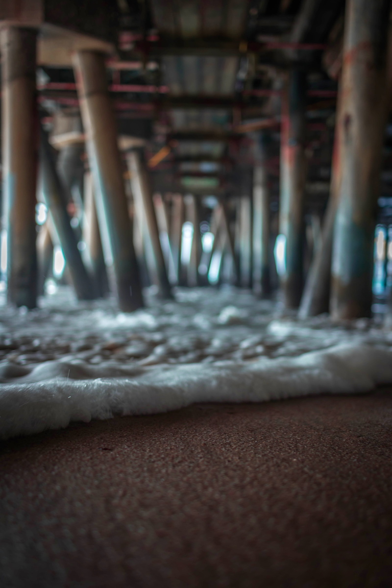 dark, wafe, underneath, architecture, focus on foreground, pier, surface level, pillar, sport, city, carpet - decor, docks, surf, santa, tide, close-up
